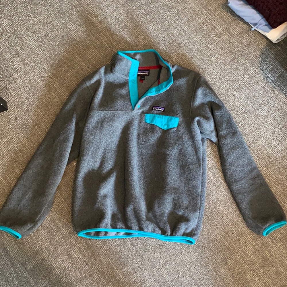 gray pullover with blue accents